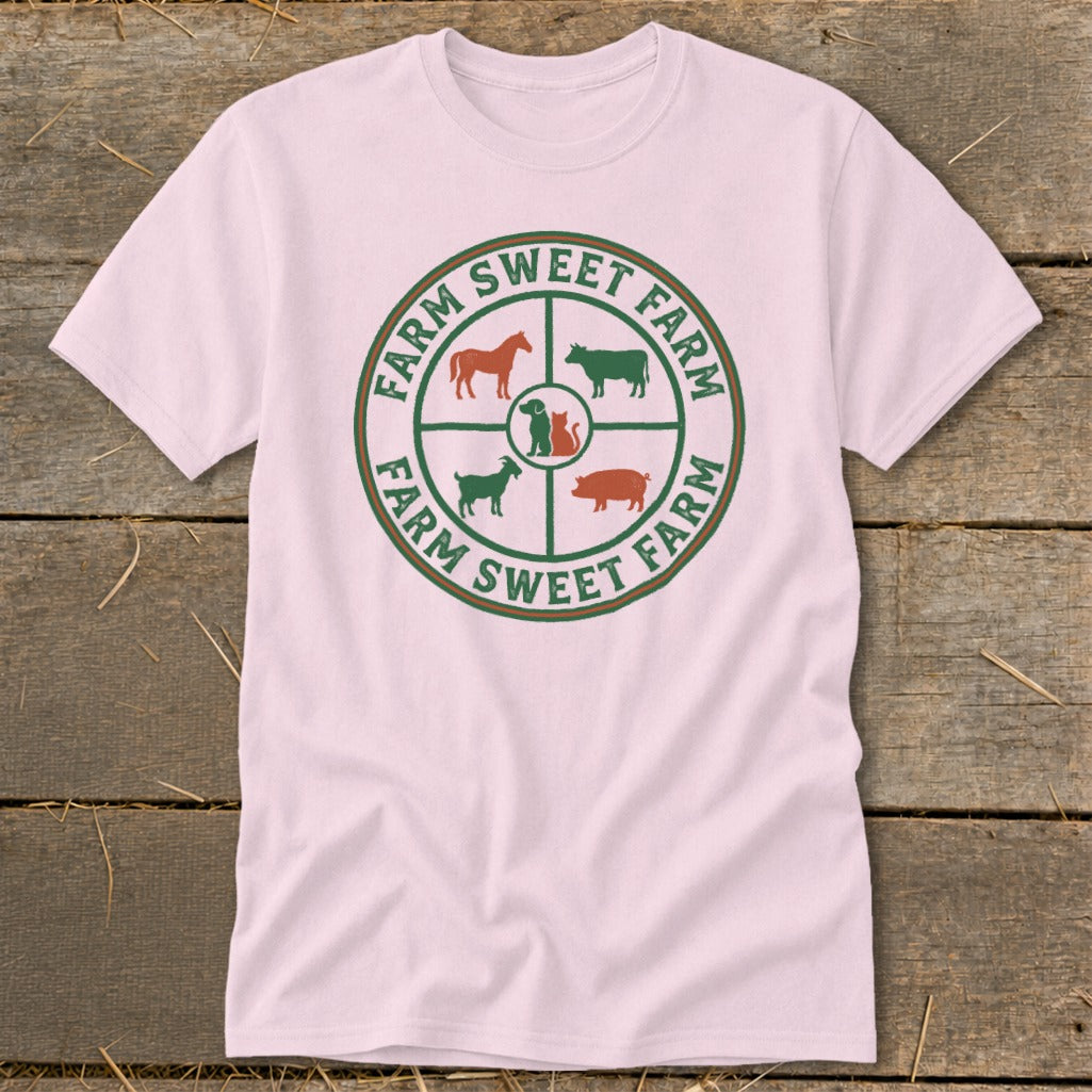Pink t-shirt with circular "Farm Sweet Farm" logo featuring farm animals.