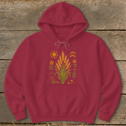 Maroon hoodie with a wheat, sun, and floral graphic on the chest.
