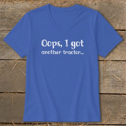 Blue v-neck t-shirt with white text that reads "Oops, I got another tractor...".