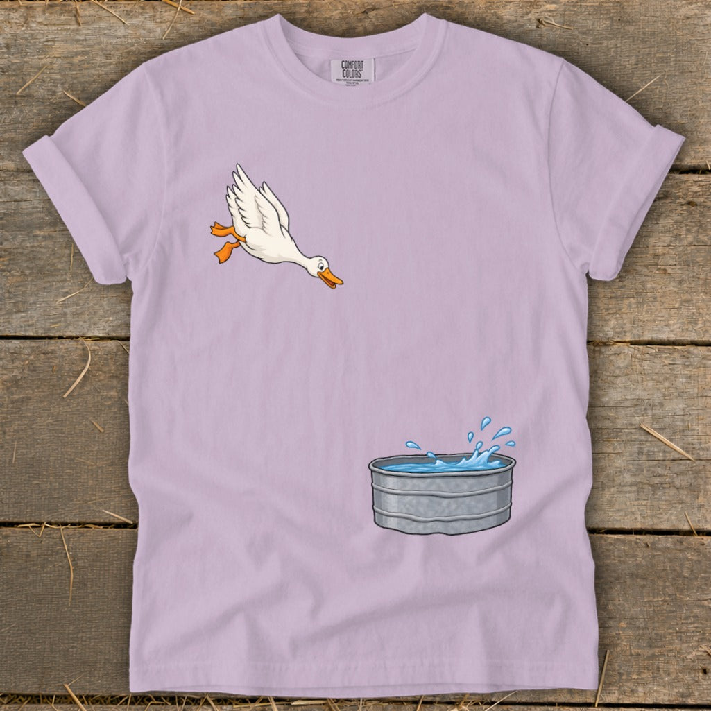 Cartoon duck jumps into a splashing galvanized water tub.