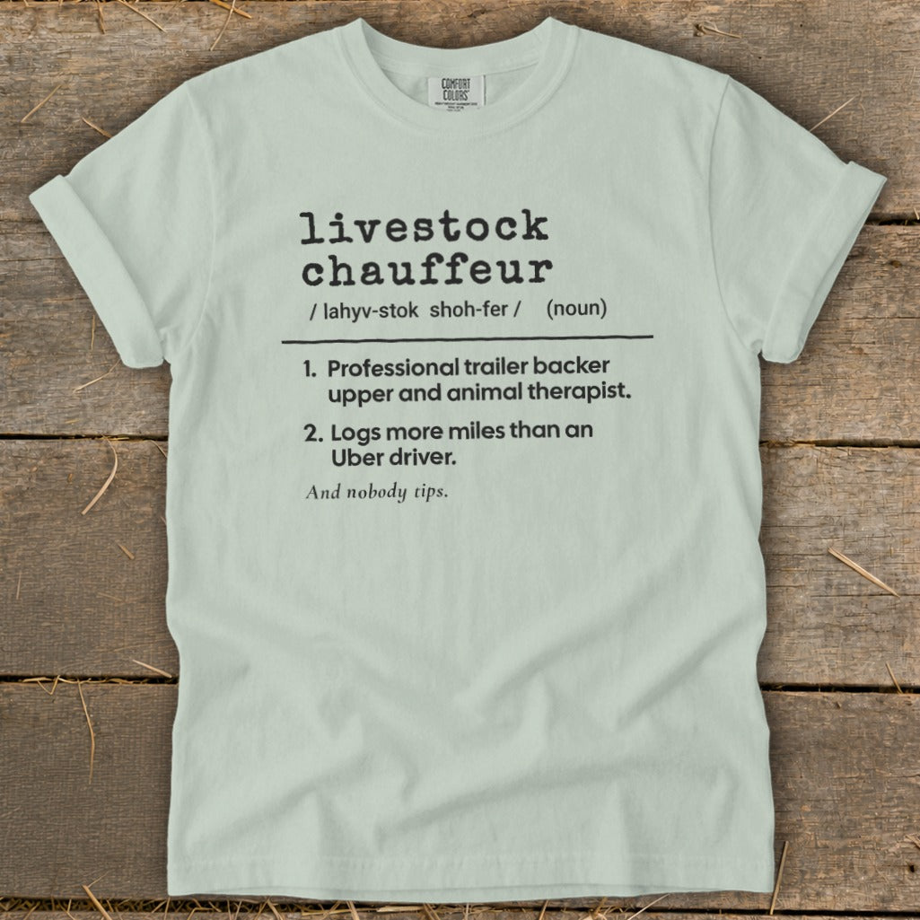 Pale green t-shirt with "livestock chauffeur" definition and "nobody tips" in black text.