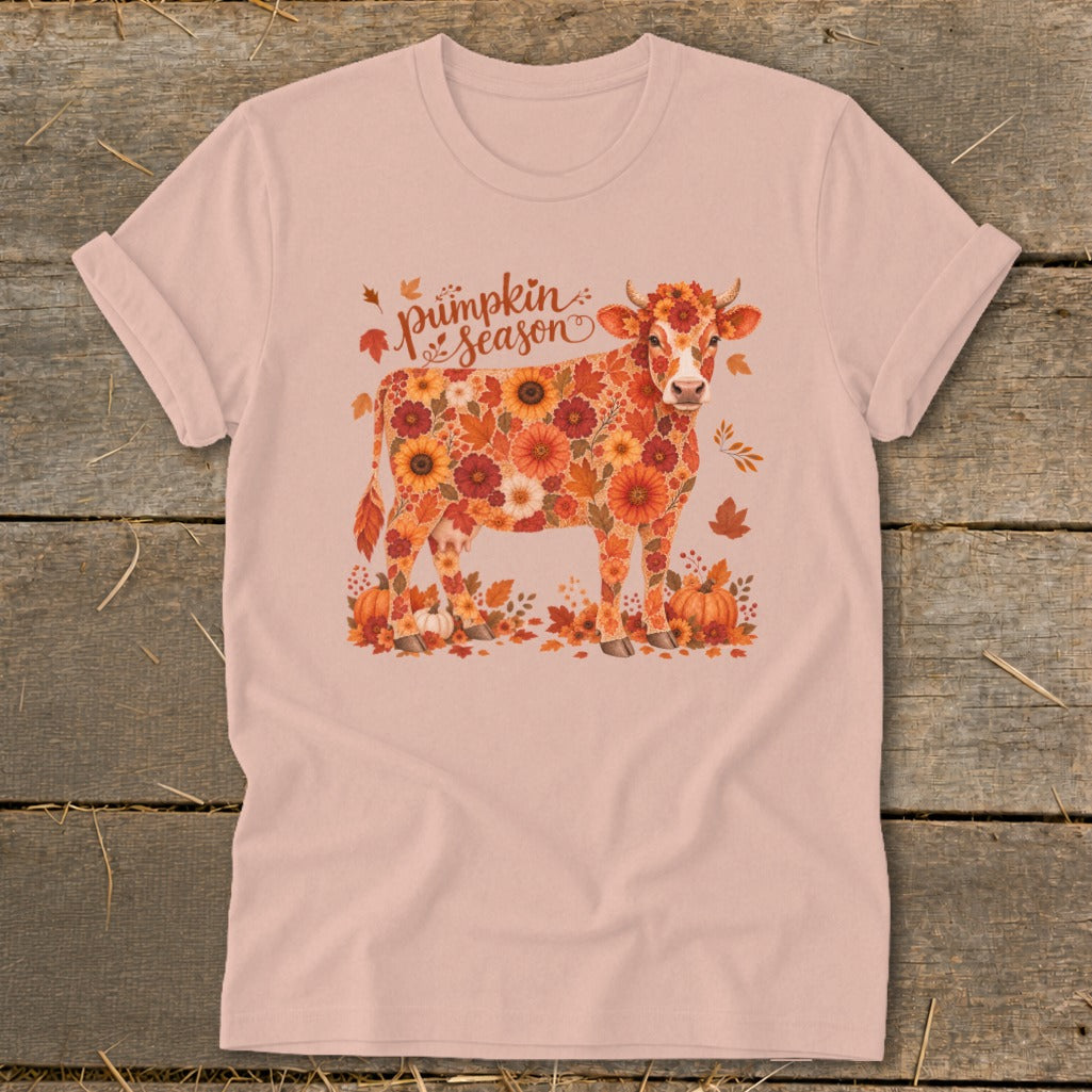Pink t-shirt with a cow illustration made of fall flowers and pumpkins, with "Pumpkin Season" text.