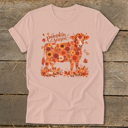 Pink t-shirt with a cow illustration made of fall flowers and pumpkins, with "Pumpkin Season" text.