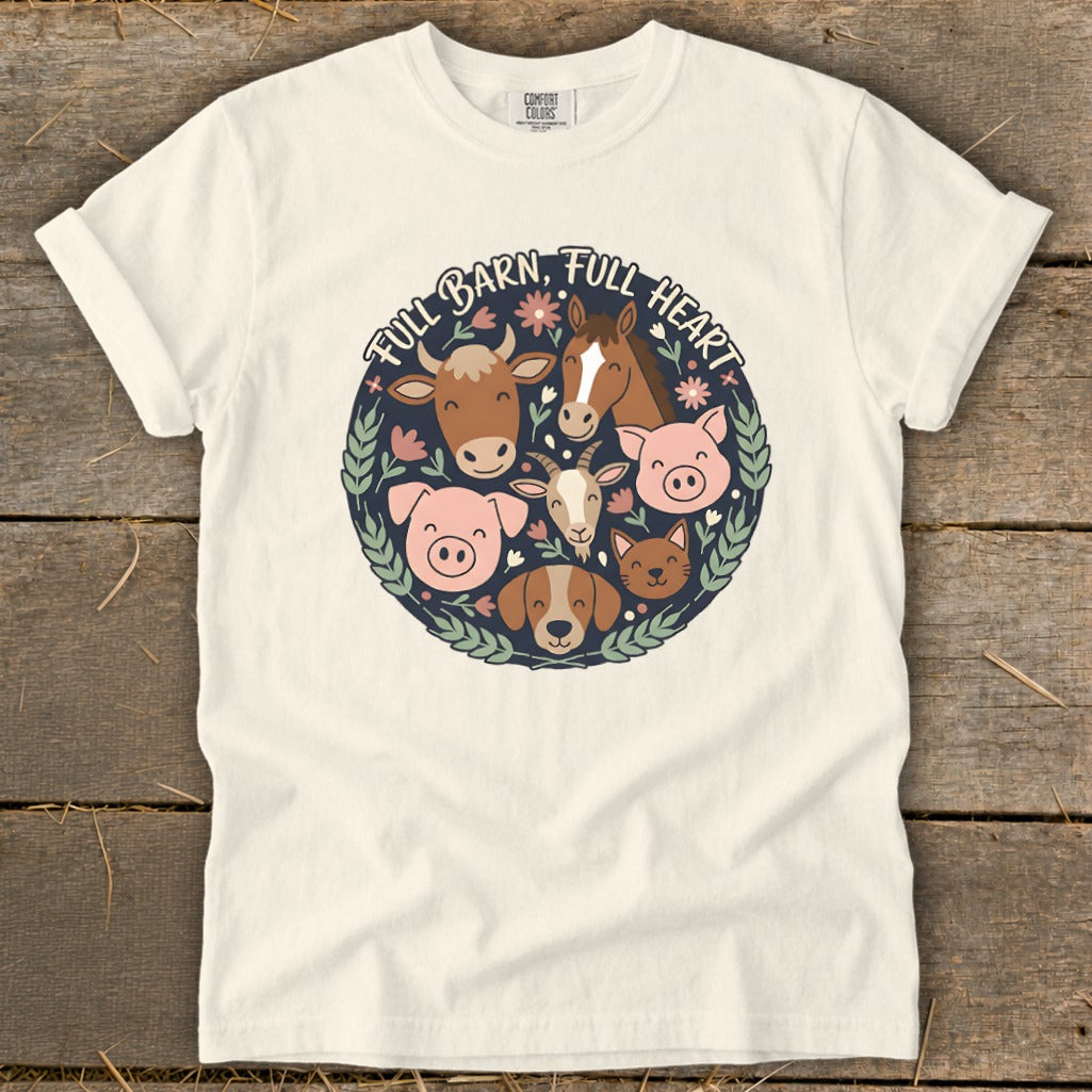 White t-shirt with a circular farm animal graphic and "Full Barn, Full Heart" text.