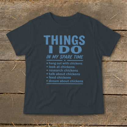 Dark t-shirt with "Things I Do In My Spare Time" and chicken-related bullet points.