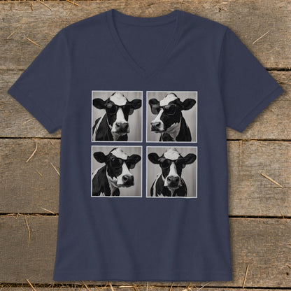 Four black and white cow portraits wearing sunglasses, arranged in a grid on a navy v-neck t-shirt.