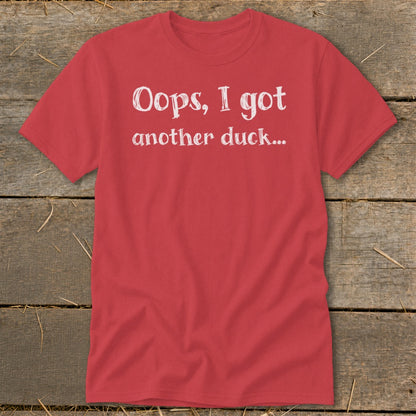 Red t-shirt with white text that reads "Oops, I got another duck..."