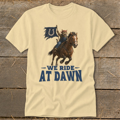Cat wearing bandana rides horse, holding tattered flag with horseshoe; "We Ride At Dawn" text.