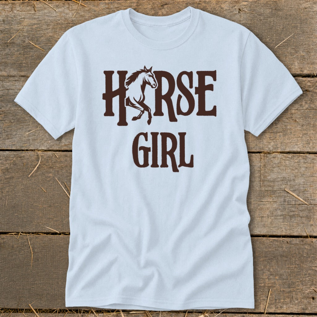 Light blue t-shirt with dark brown text "HORSE GIRL" and a galloping horse silhouette.