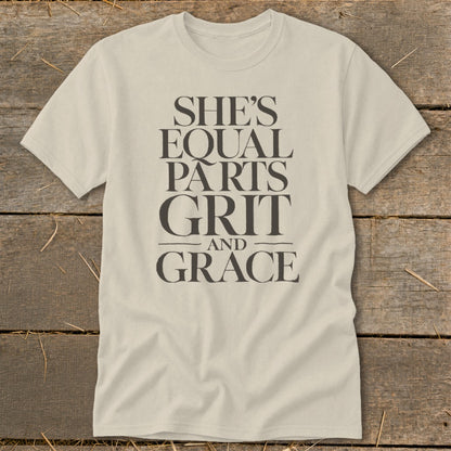 Cream t-shirt with "She's Equal Parts Grit and Grace" text.