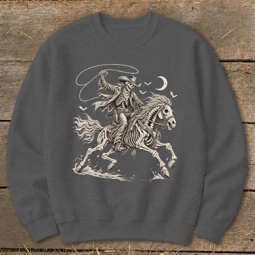 Skeleton cowboy on a skeleton horse with lasso under a crescent moon.