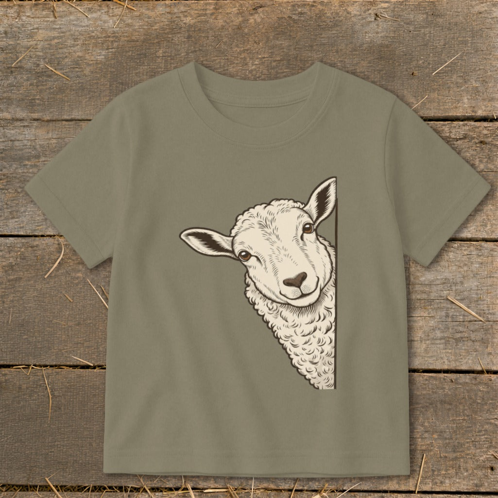 T-shirt with a drawing of a sheep peeking from the side.