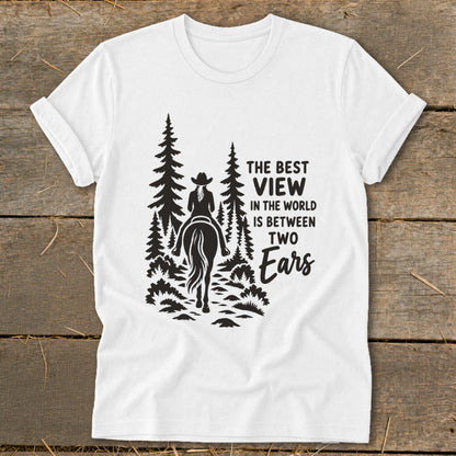White t-shirt featuring a black graphic of a horseback rider in the forest with text.