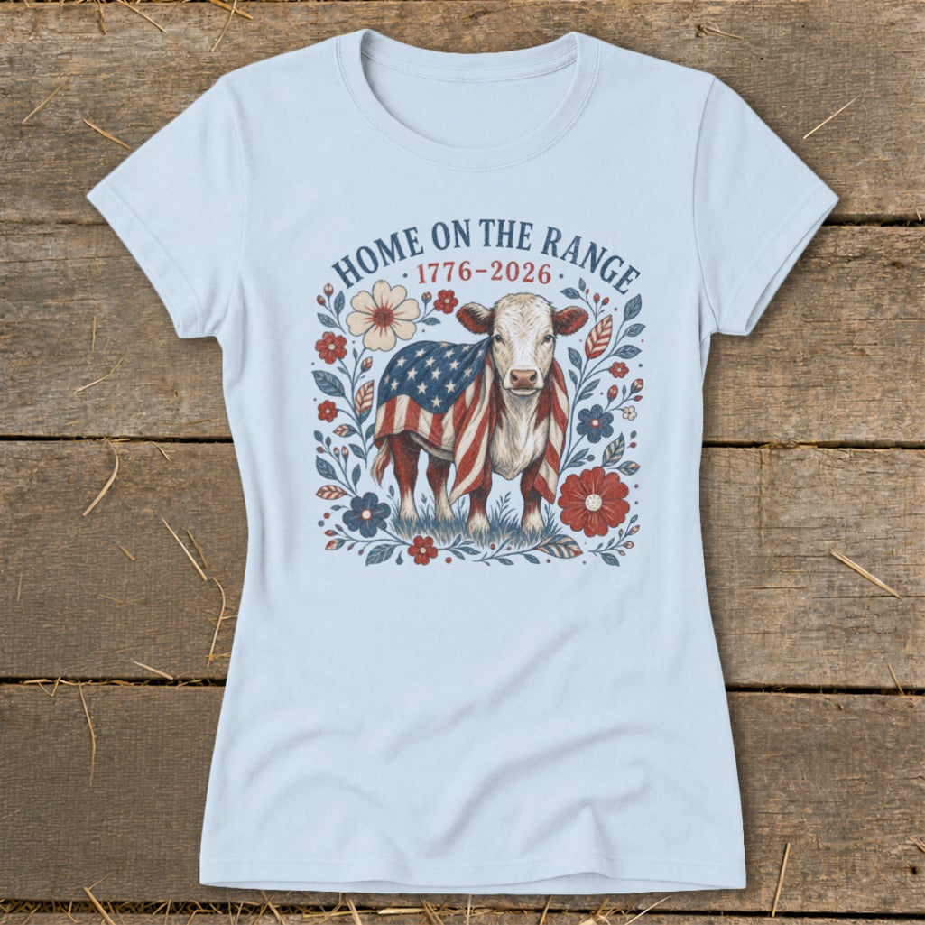 Light blue t-shirt with cow graphic wearing American flag, "Home on the Range 1776-2026".