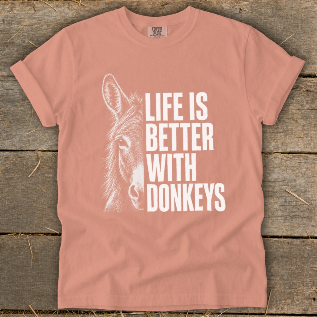 Peach t-shirt with donkey illustration and "Life is Better With Donkeys" text.