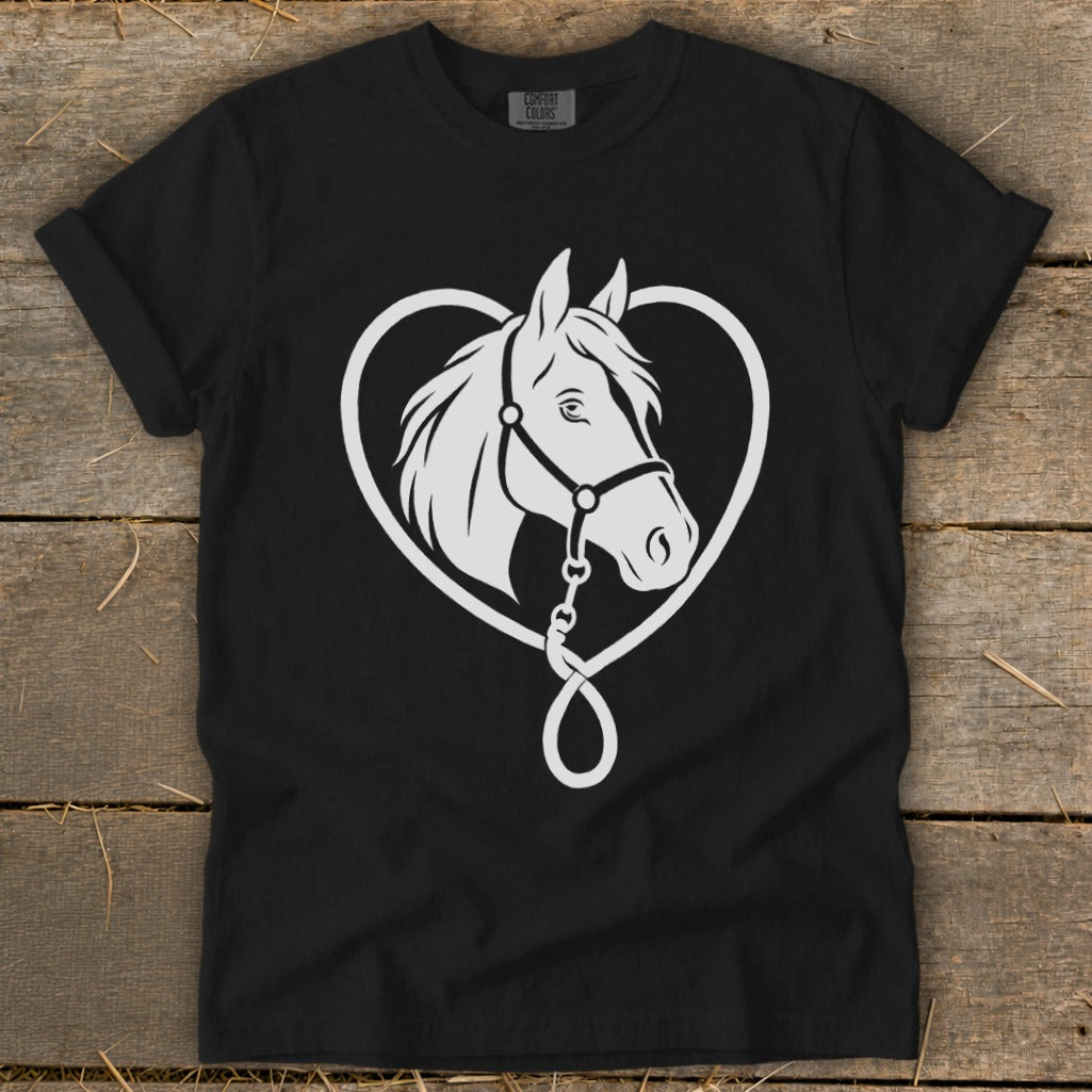 A black t-shirt featuring a white graphic of a horse's head framed by a heart and lead rope.