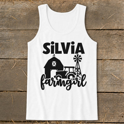 White tank top with black "SilVia farmgirl" text, barn, tractor, and windmill graphic.
