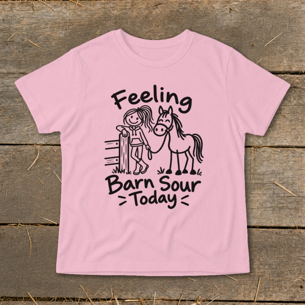 Pink t-shirt with black text and drawing of girl and horse, reads "Feeling Barn Sour Today".