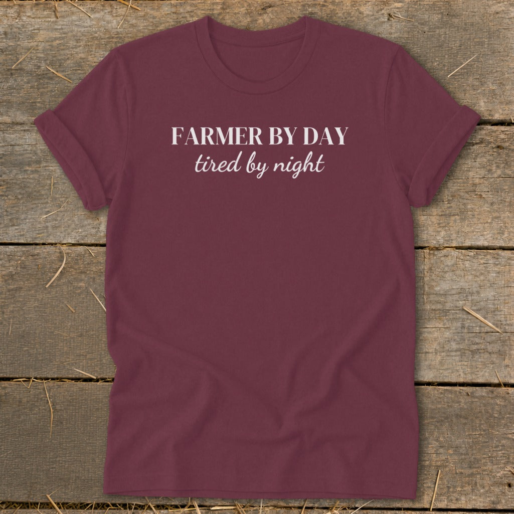Maroon t-shirt with "FARMER BY DAY tired by night" text.