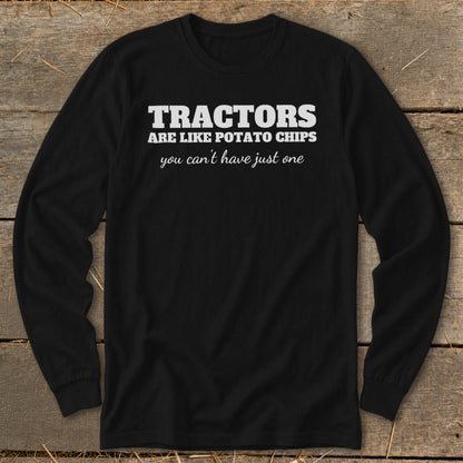 Black long-sleeve shirt with white text: "TRACTORS ARE LIKE POTATO CHIPS you can't have just one"