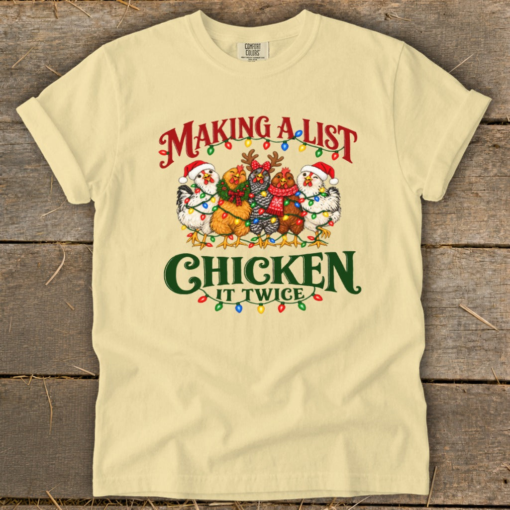 T-shirt with "Making a list Chicken it twice" and five festive chickens.