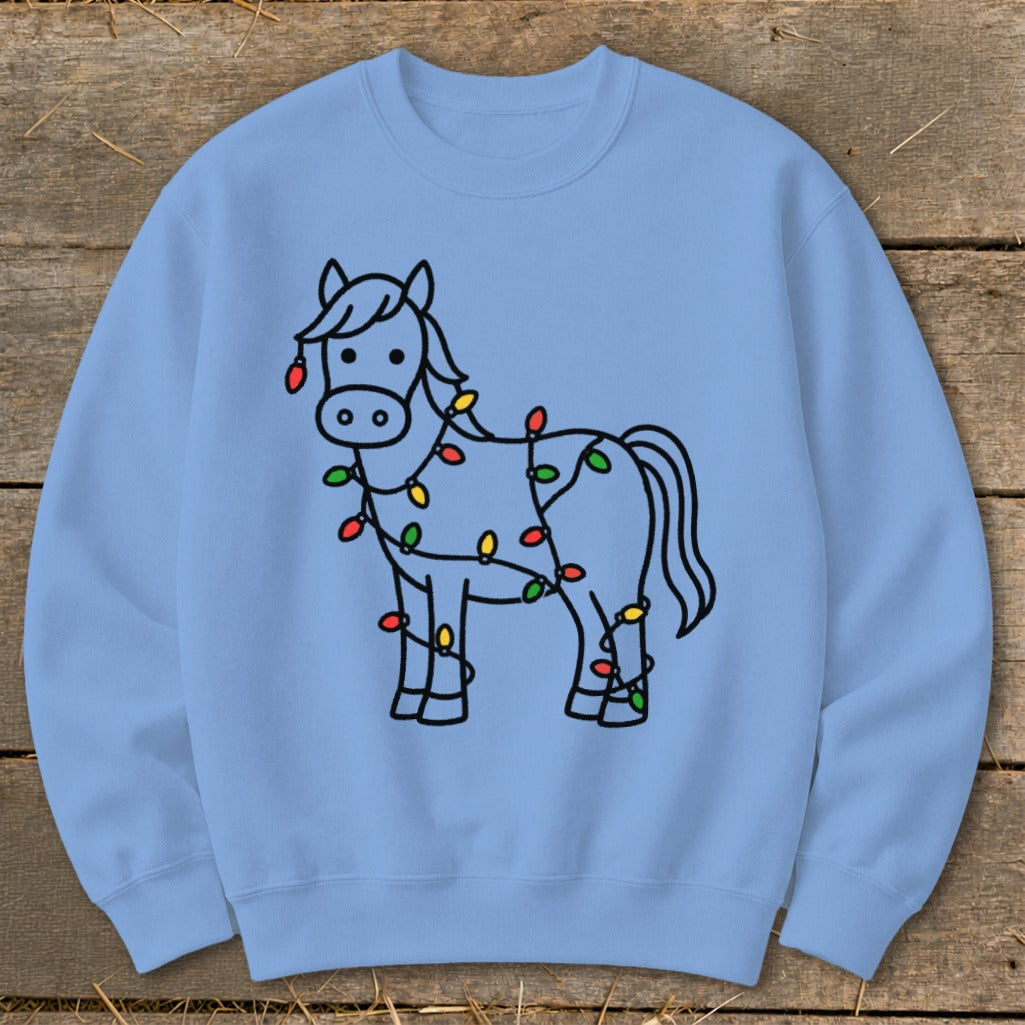 Light blue sweatshirt with a black outline drawing of a horse wrapped in colorful Christmas lights.