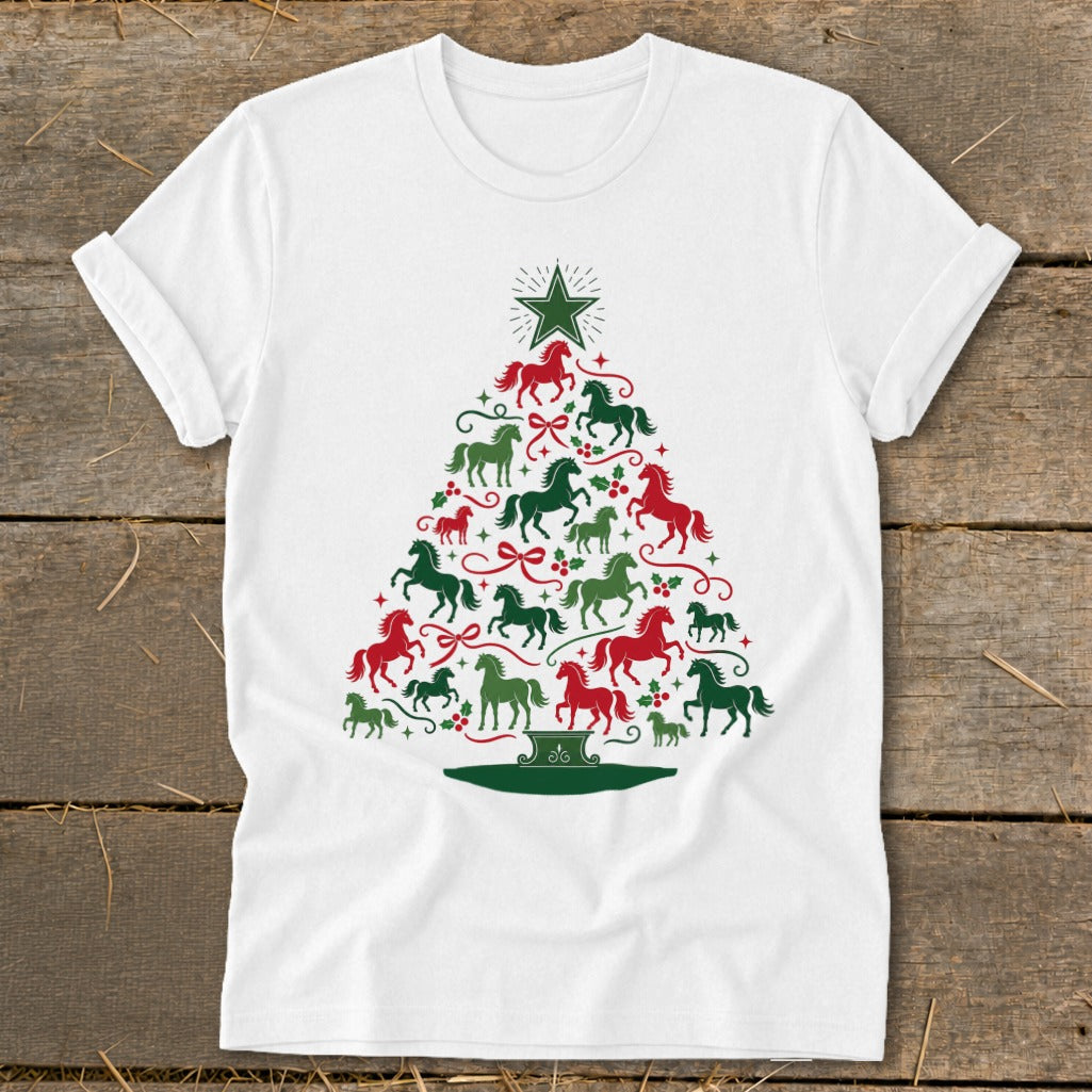 White t-shirt with a Christmas tree made of red and green horses and holly.