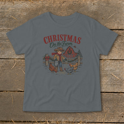 Boy in cowboy hat feeding chickens on a farm with text "Christmas On the Farm".