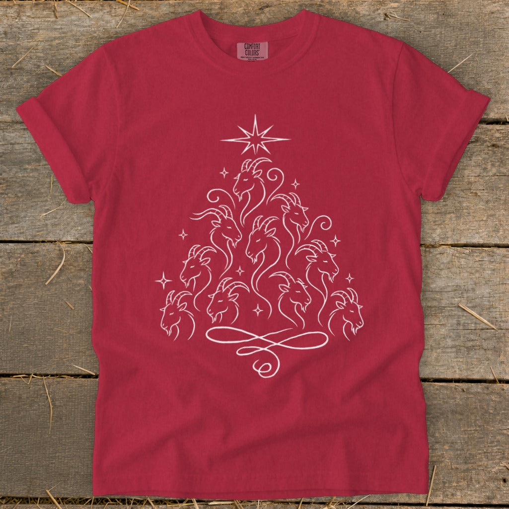 Red t-shirt with a white line drawing of goats forming a Christmas tree shape.