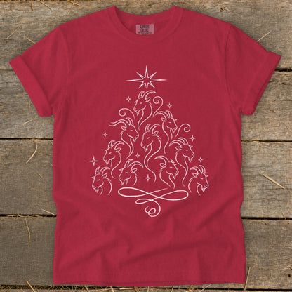 Red t-shirt with a white line drawing of goats forming a Christmas tree shape.