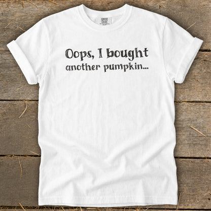 White t-shirt with black text that reads "Oops, I bought another pumpkin..."