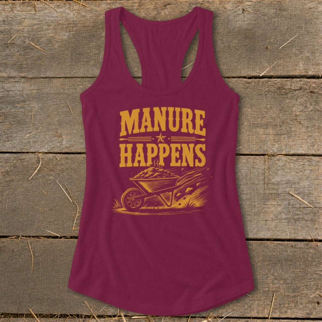 Maroon tank top with "Manure Happens" text and wheelbarrow graphic.