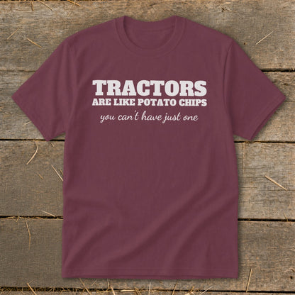 Burgundy t-shirt with white text "TRACTORS ARE LIKE POTATO CHIPS you can't have just one".