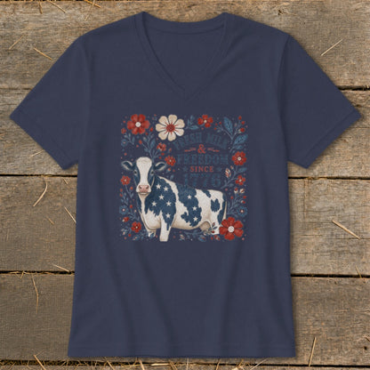 Navy v-neck t-shirt with a cow patterned with the American flag and text.