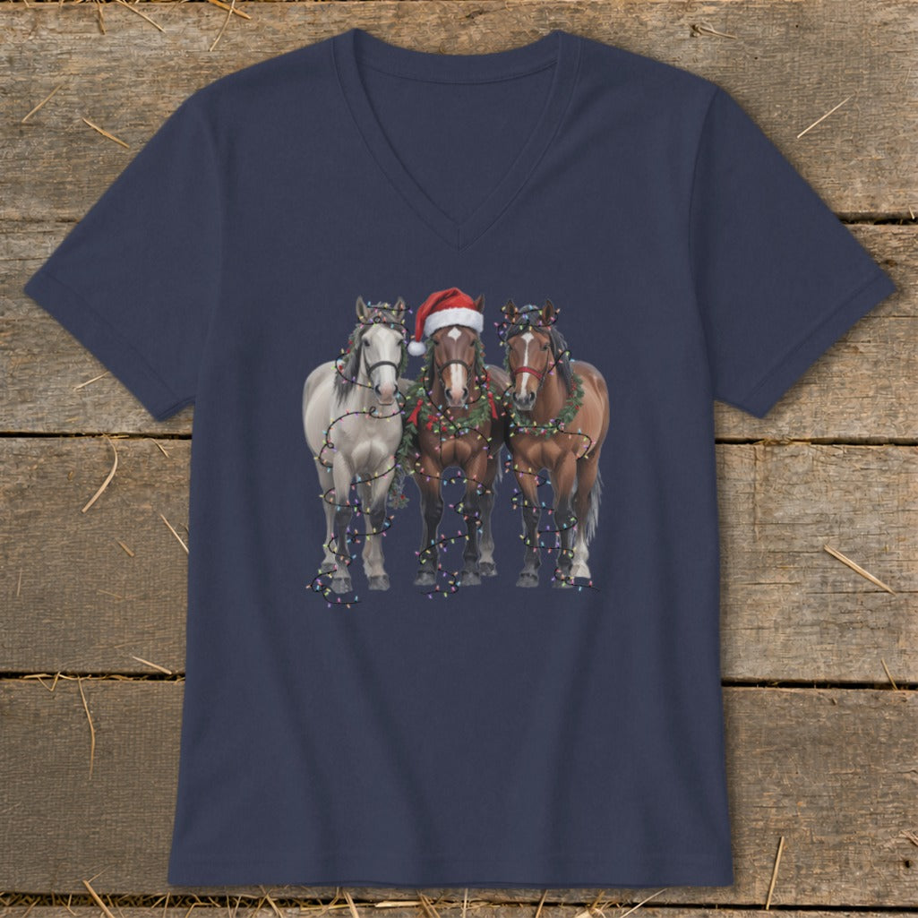 Three horses with Christmas lights and Santa hat on navy t-shirt.