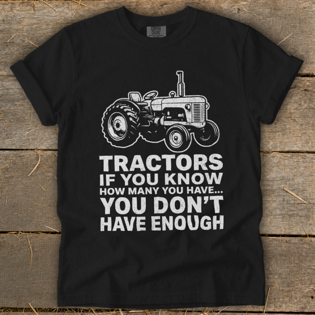 Black t-shirt with vintage tractor graphic and "Tractors if you know how many you have... you don't have enough."