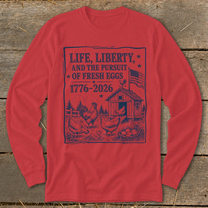 Red long-sleeve shirt with "Life, Liberty, and the Pursuit of Fresh Eggs" graphic.
