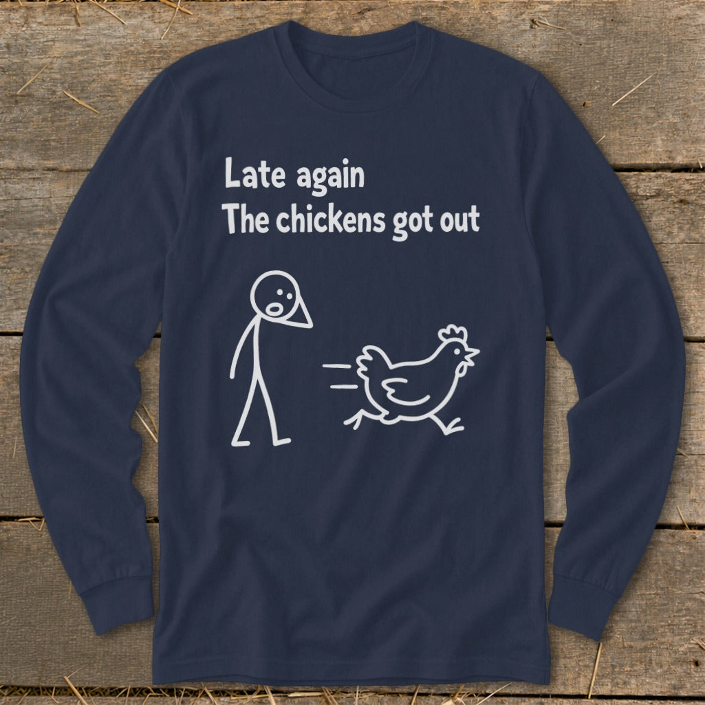 Dark blue long sleeve shirt with white text "Late again The chickens got out" and stick figures.