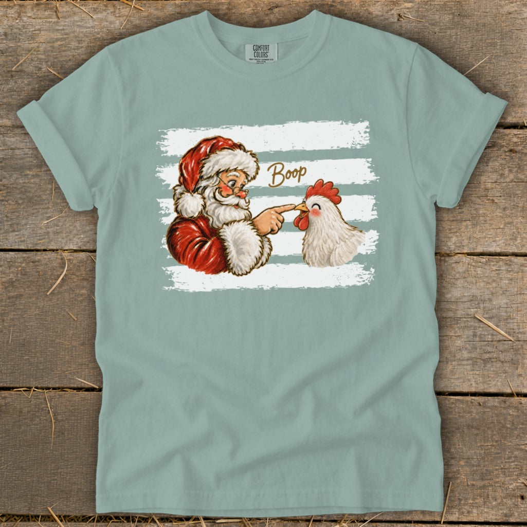 Santa Claus boops a chicken with his finger, text says "Boop".