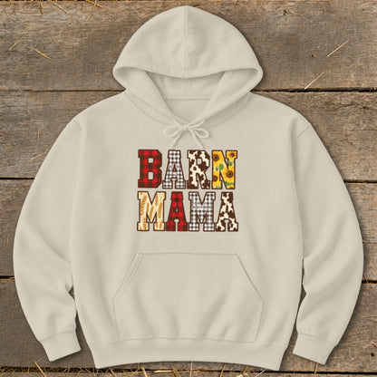 Light cream hoodie with "Barn Mama" text in plaid, cow print, sunflower, and wheat patterns.