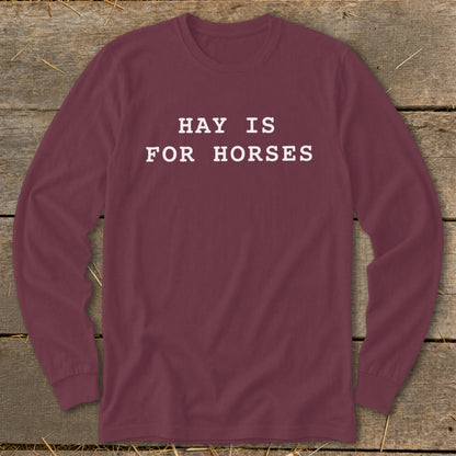 Maroon long-sleeve shirt with white text "HAY IS FOR HORSES."