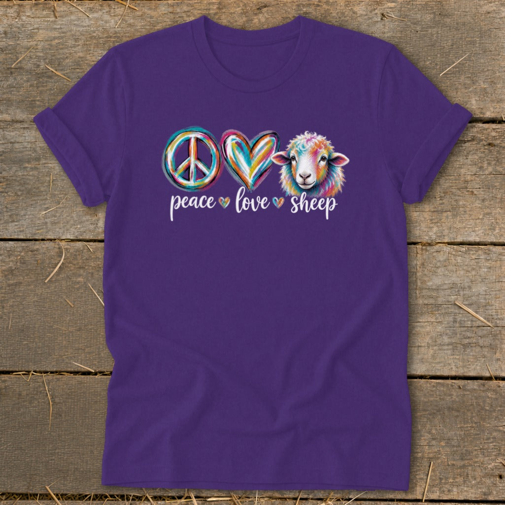 Purple t-shirt with a peace sign, heart, and colorful sheep graphic.