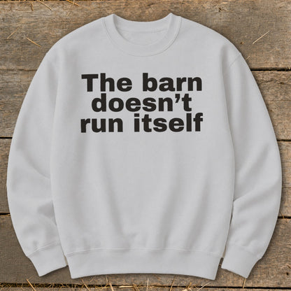 White sweatshirt with black text: "The barn doesn't run itself"