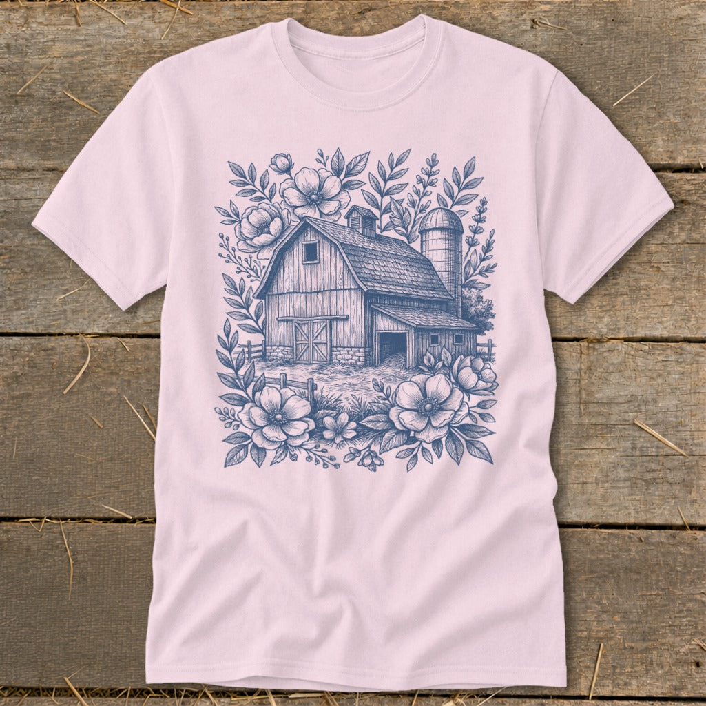 T-shirt with barn, silo, and floral sketch design in blue ink.