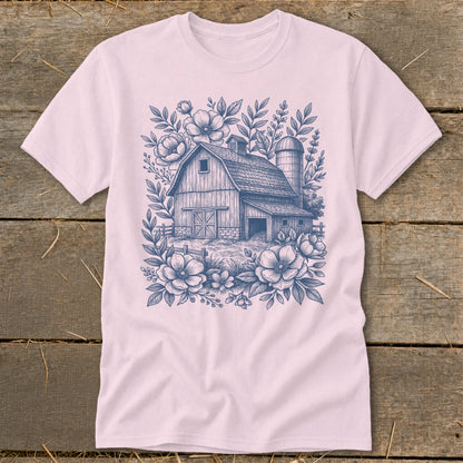 T-shirt with barn, silo, and floral sketch design in blue ink.