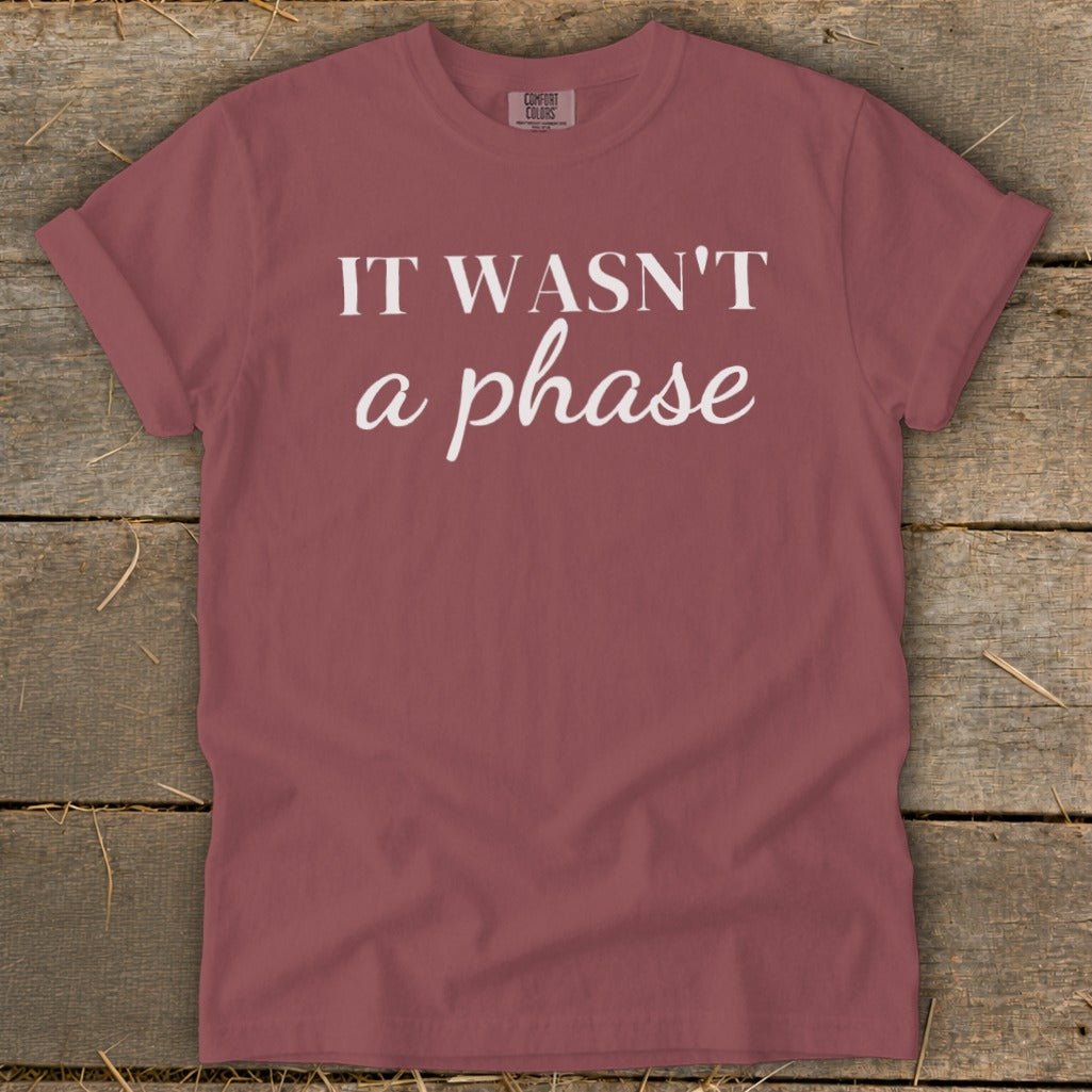 Rose t-shirt with white text that reads "IT WASN'T a phase".
