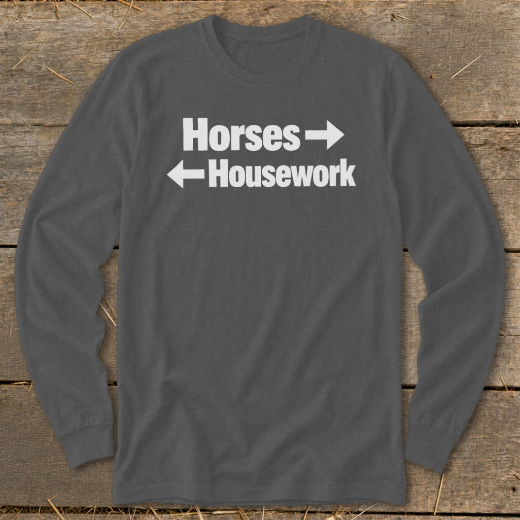 Dark gray long-sleeve t-shirt with white text reading Horses with a right arrow above Housework with a left arrow.