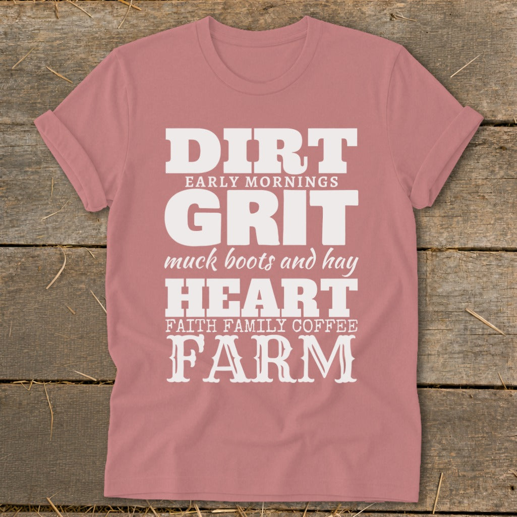 Pink t-shirt with white text: "Dirt, Early Mornings, Grit, Muck Boots and Hay, Heart, Faith Family Coffee, Farm."