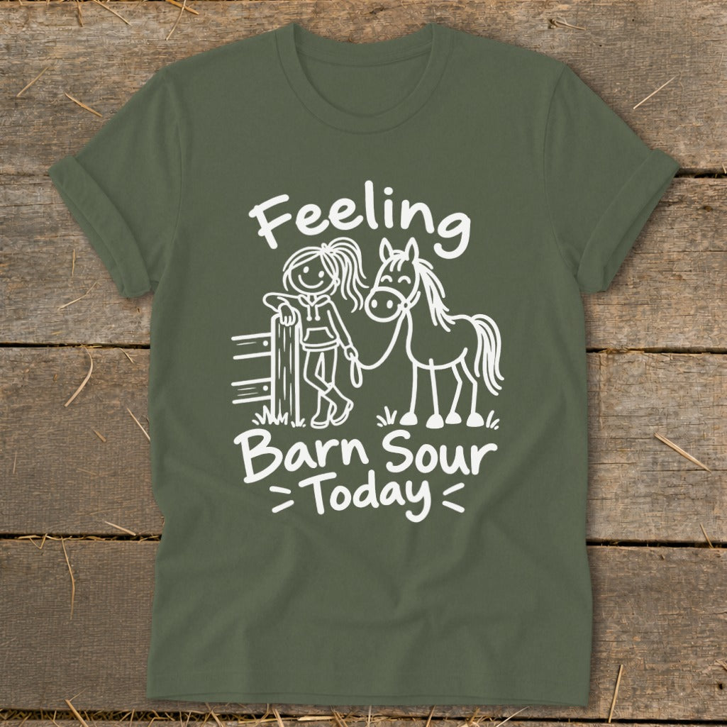 Green t-shirt with white cartoon of girl and horse, text "Feeling Barn Sour Today".