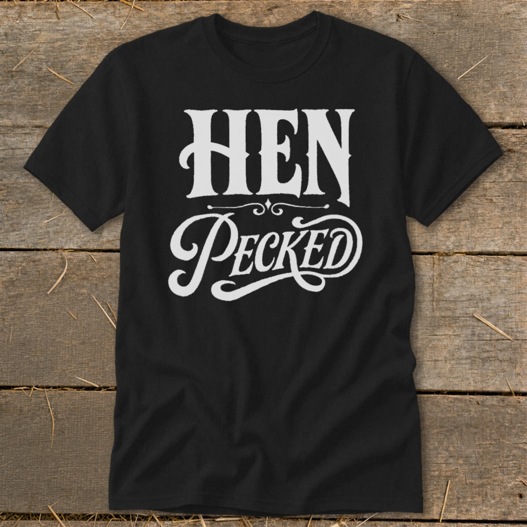 Black t-shirt with white text that reads "HEN Pecked" in decorative font.